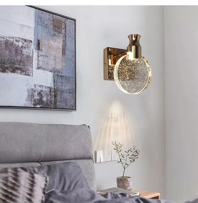 Lampada a cristallo di cromo a bolla a LED moderna decorata con lampada da letto a scone rotonda a cristallo