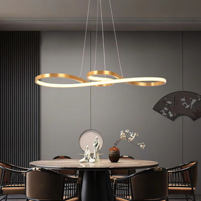 Luce a pendente in acrilico in oro e bianco a spirale per il soggiorno e la cucina aperta o per la decorazione dell'illuminazione del letto