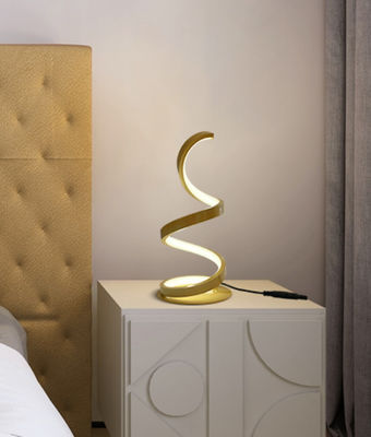 Nuova lampada da tavolo da letto acrilica in oro a spirale