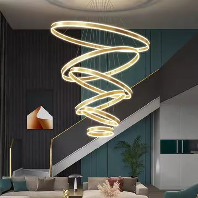 Moderno candelabro grande lampadario a collante a led lusso acrilico regolabile a cerchio lampada ad anello al soffitto alto per la sala da pranzo dell'hotel