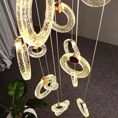 Moderna villa appartamento soggiorno camera da letto lampada a cristallo scala lunga lampada a tre colori luce e luce semplice anello di lusso
