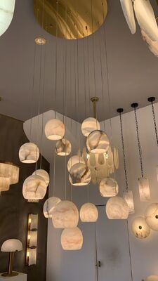 Lampada a sospensione orizzontale ovale in alabastro per ristorante, scala, lampada a LED lineare artistica, lampadario a grappolo in marmo